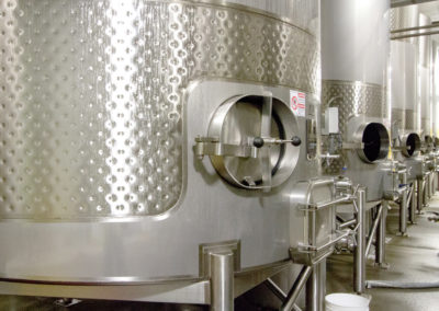 Photo of temperature controlled stainless steel wine storage tanks at Rack & Riddle