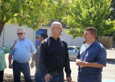 Bruce Lundquist talking to a guest at our Grand Opening celebration in Healdsburg, 2014.