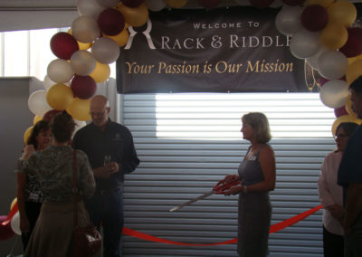 Ribbon cutting ceremony at our 2014 Grand Opening celebration at our Healdsburg, California facility, while Bruce Lundquist talks to guests.