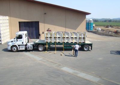 Flat-bed grape tuck delivering several bins of Pinot Noir grapes.