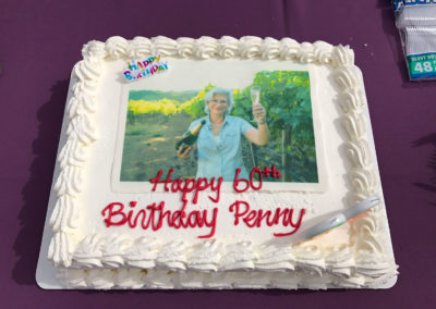 Penny Gadd Coster's 60th birthday cake that has a photo of her on the cake.