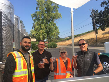 Head Winemaker, Manveer Sandhu, General Manager, Mark Garaventa, Executive Director of Winemaking, Penny Gadd-Coster and client-winemaker, Keith Hock, toasting the first grapes of harvest 2018.
