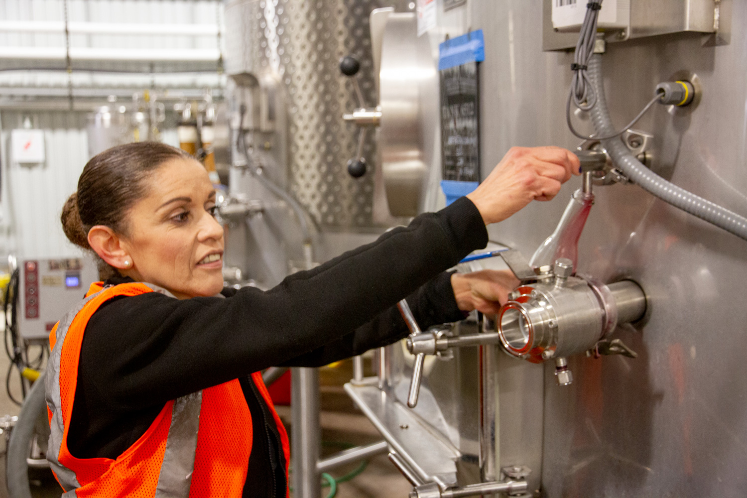 Maria working in the cellar at Rack and Riddle