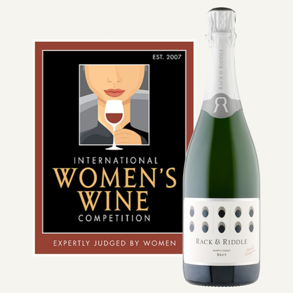 Rack & Riddle wins GOLD and 94 pts for North Coast Brut at the 2020 International Women's Wine Competition. 2020 International Women's Wine Competitions logo and a bottle of Rack & Riddle Brut